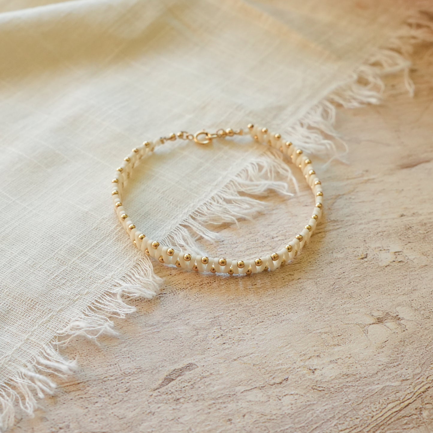 bracelet with white Japanese glass and gold-fill ball beads