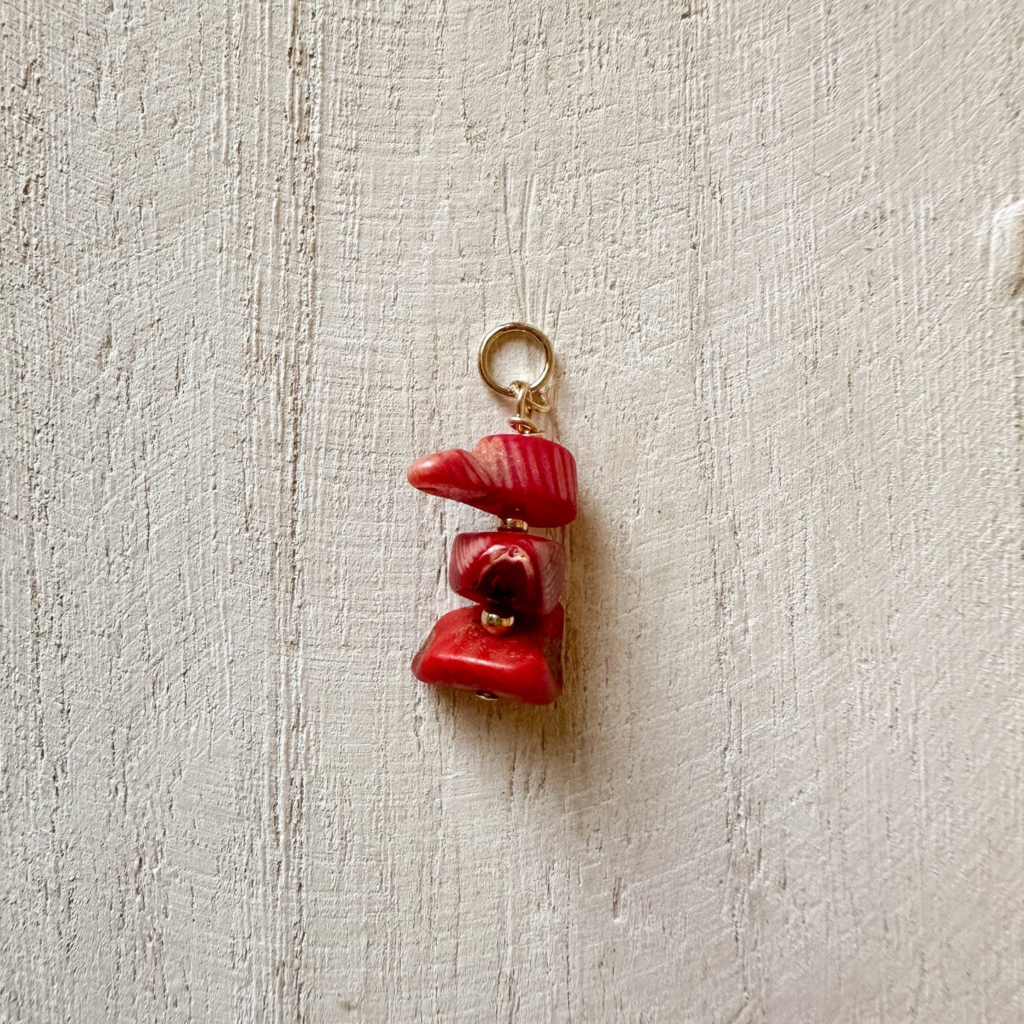 raw Ecuadorian coral charm