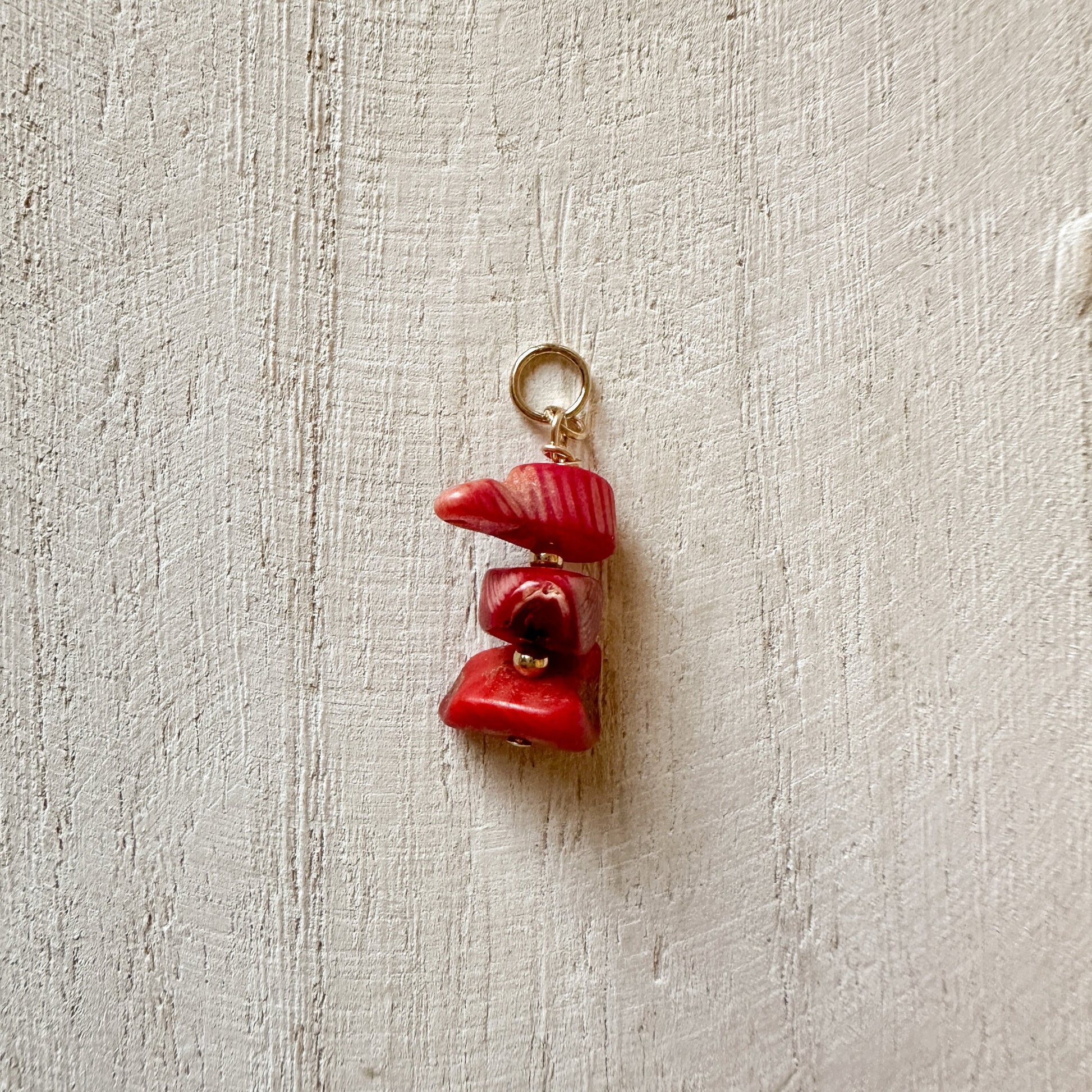 raw Ecuadorian coral charm