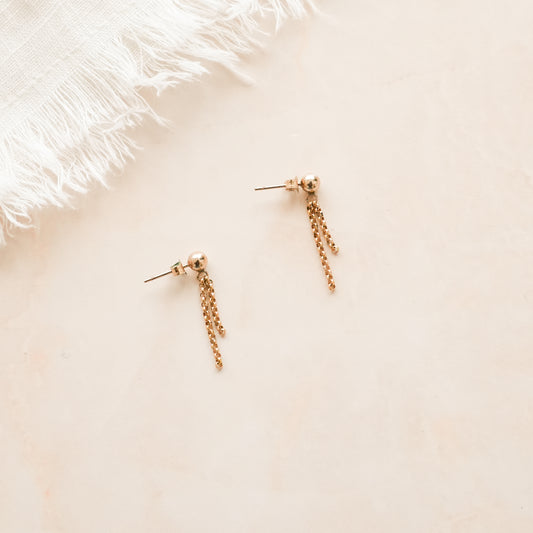 pair of earrings with two dangling gold-filled chains from a spherical post