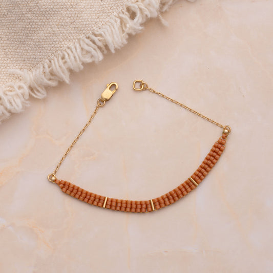 coral-colored Japanese delicate glass bead bracelet