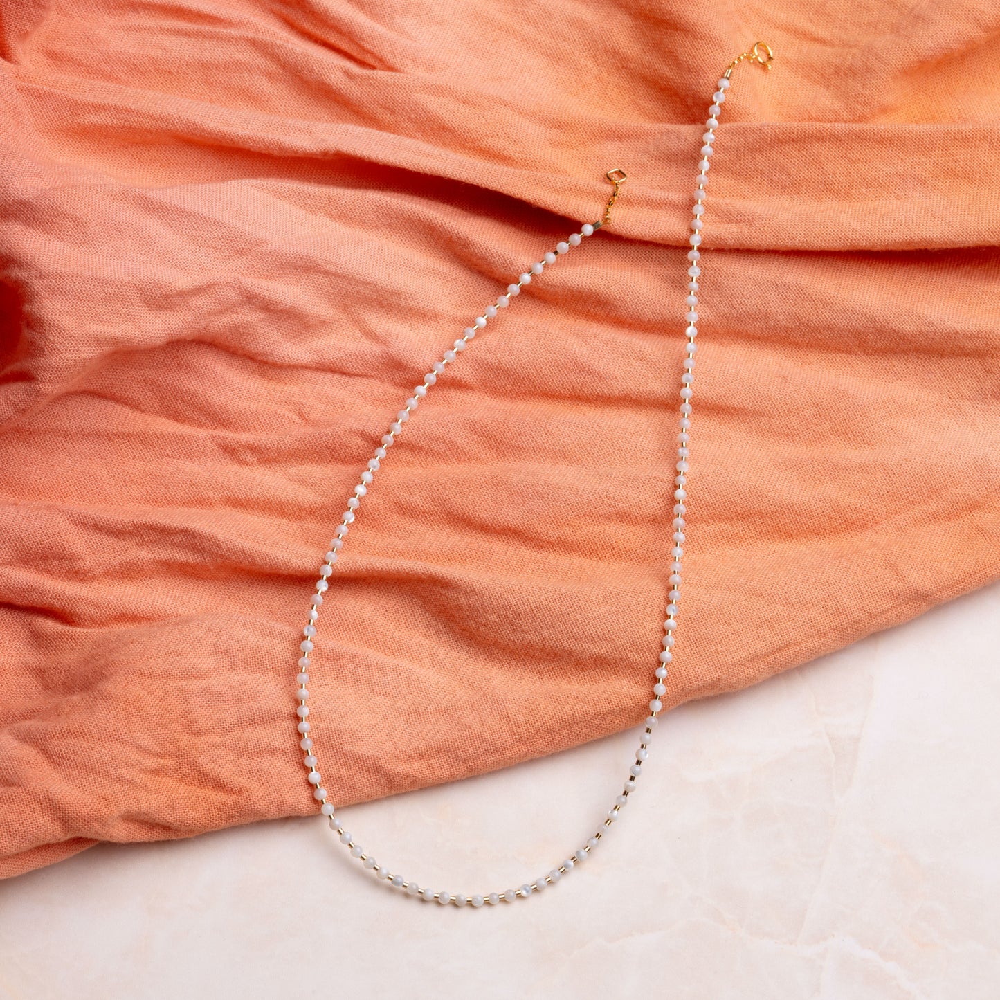 necklace with mother of pearl ball beads