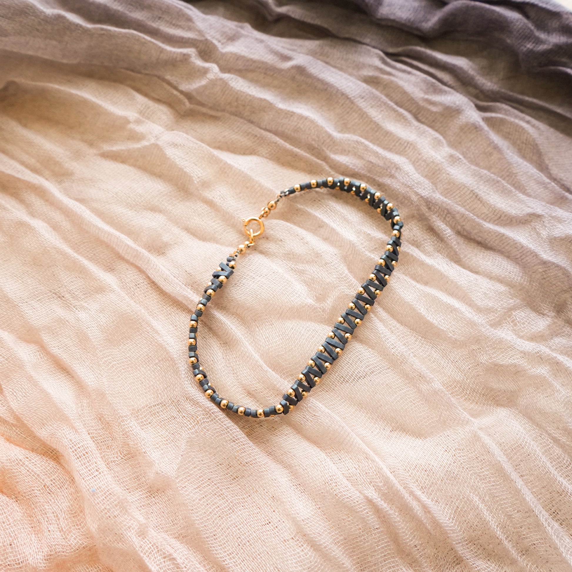 bracelet with Japenese blue-gray glass beads with gold-fill ball accent beads
