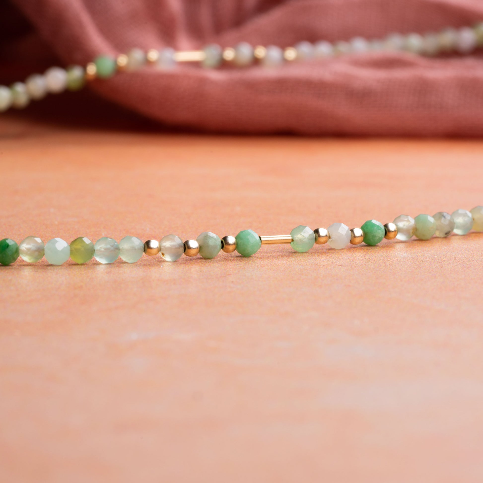 close up of necklace with Chrysoprase stones and gold-filled beads