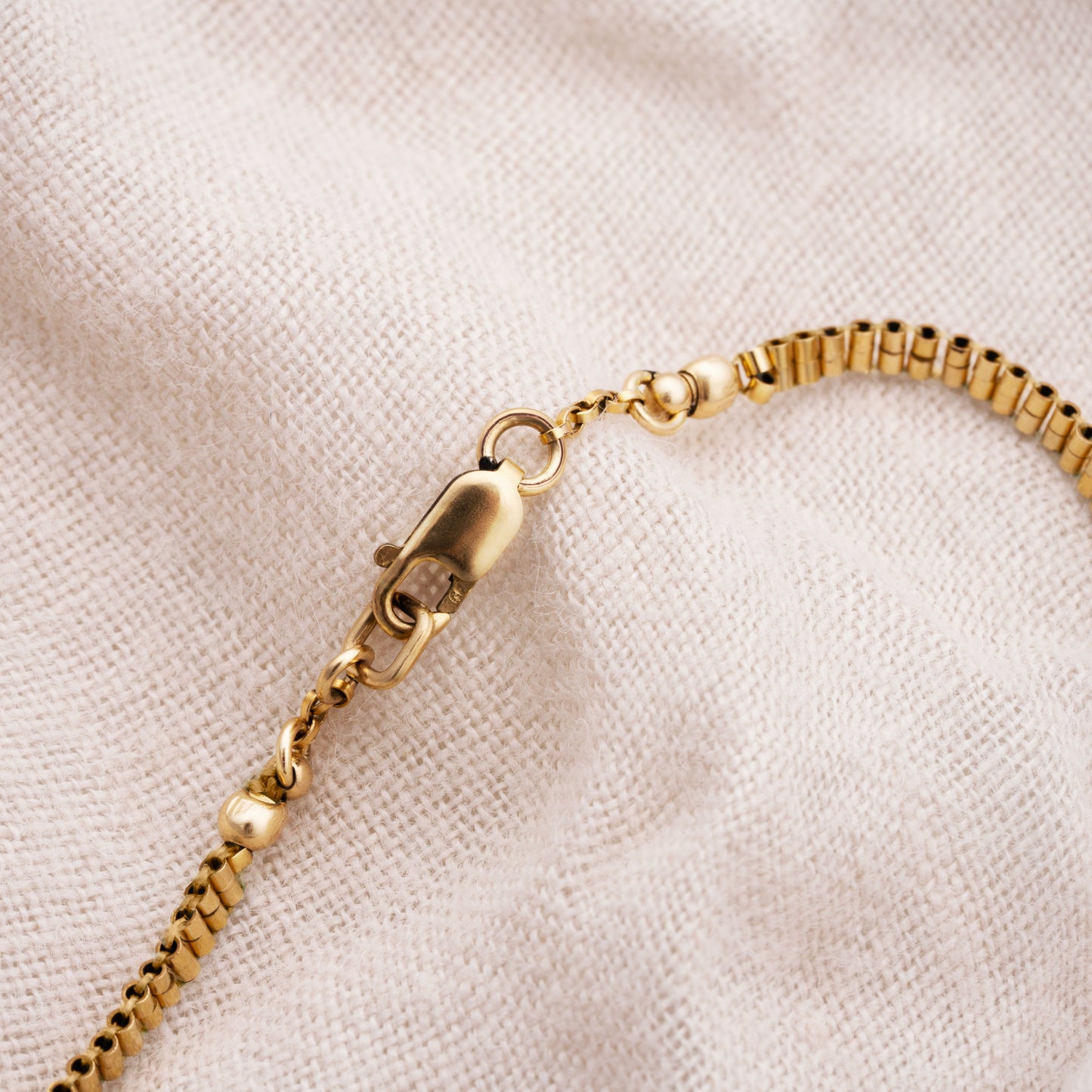 clasp on a bracelet with gold-filled beads