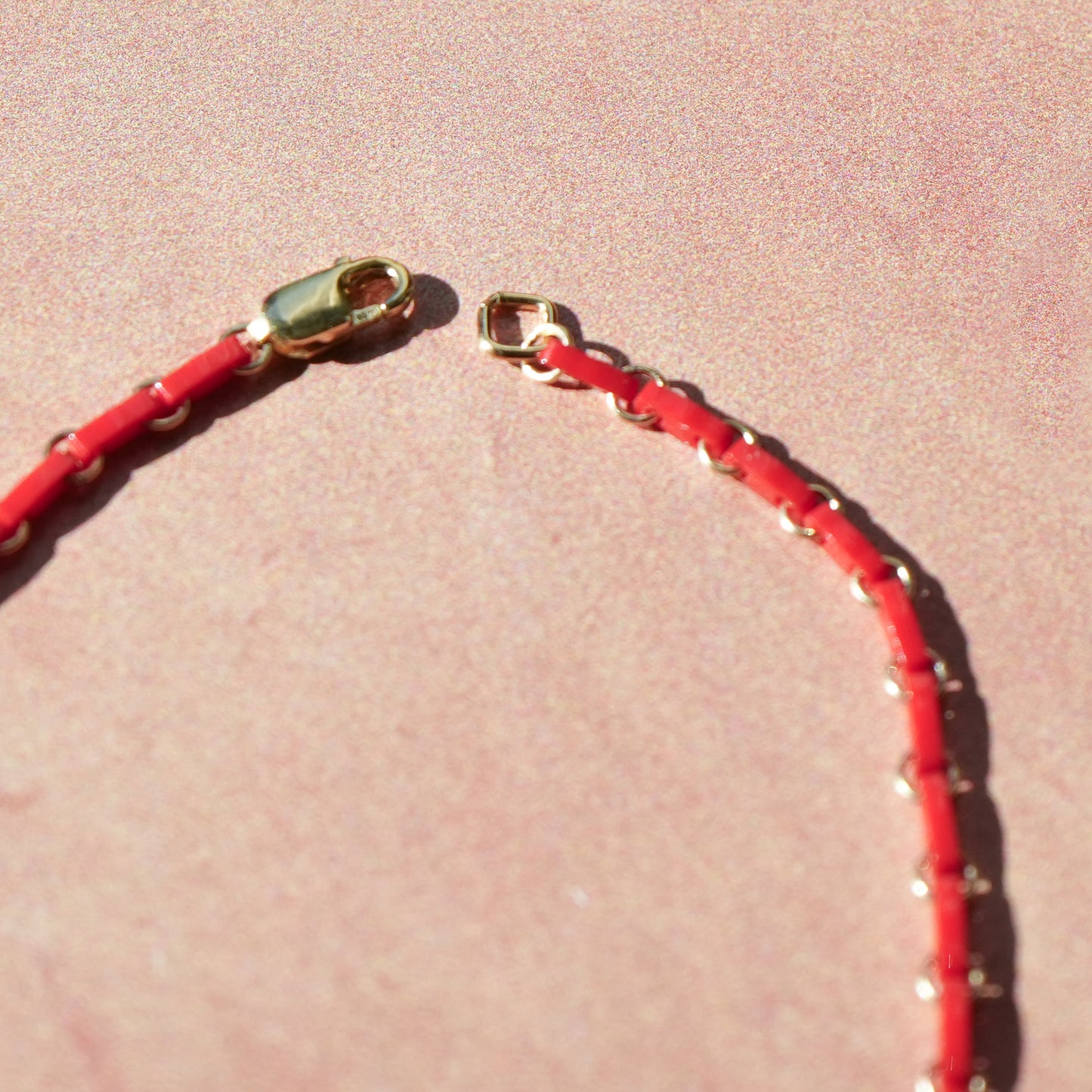 clasp on a red Japanese glass bead bracelet