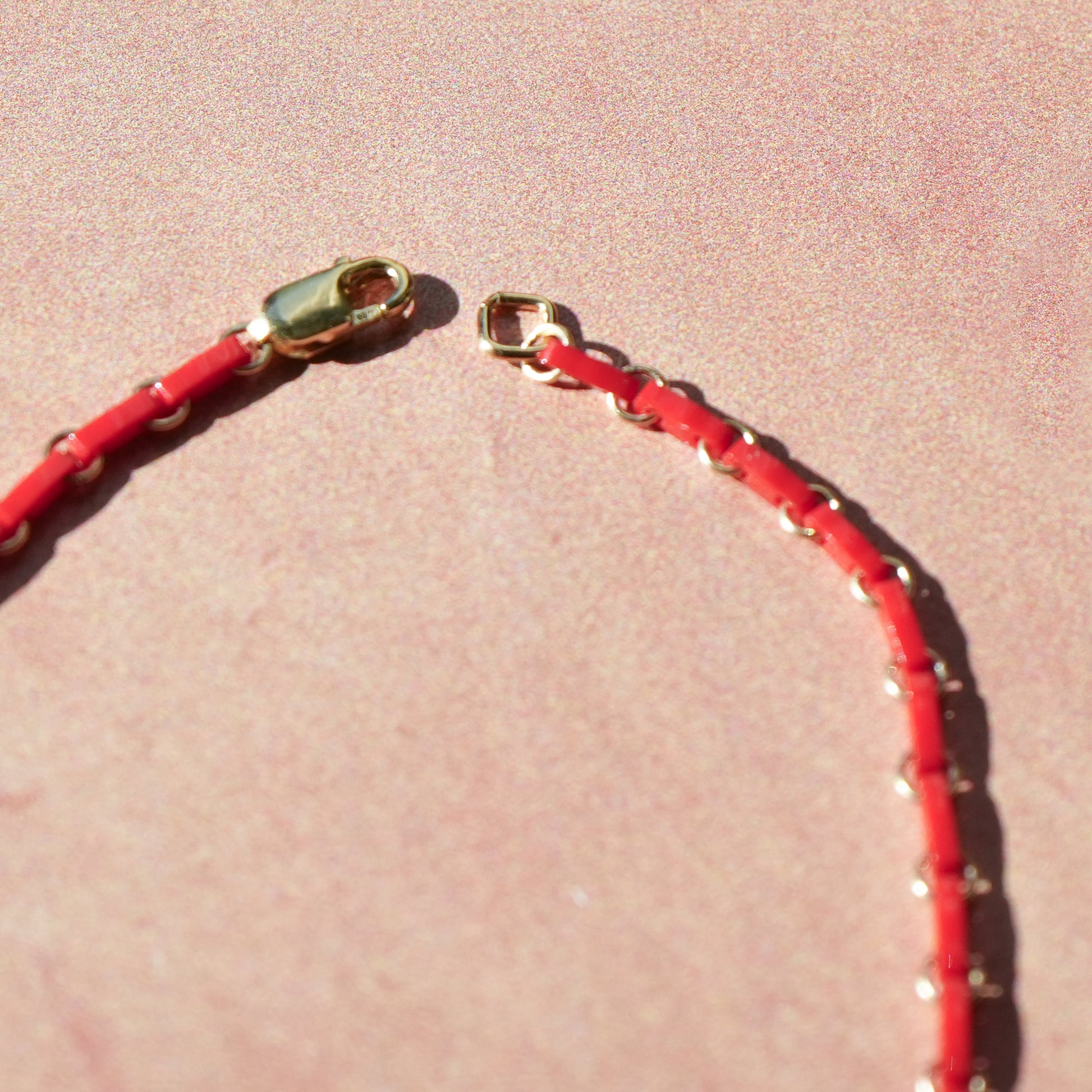 clasp on a red Japanese glass bead bracelet