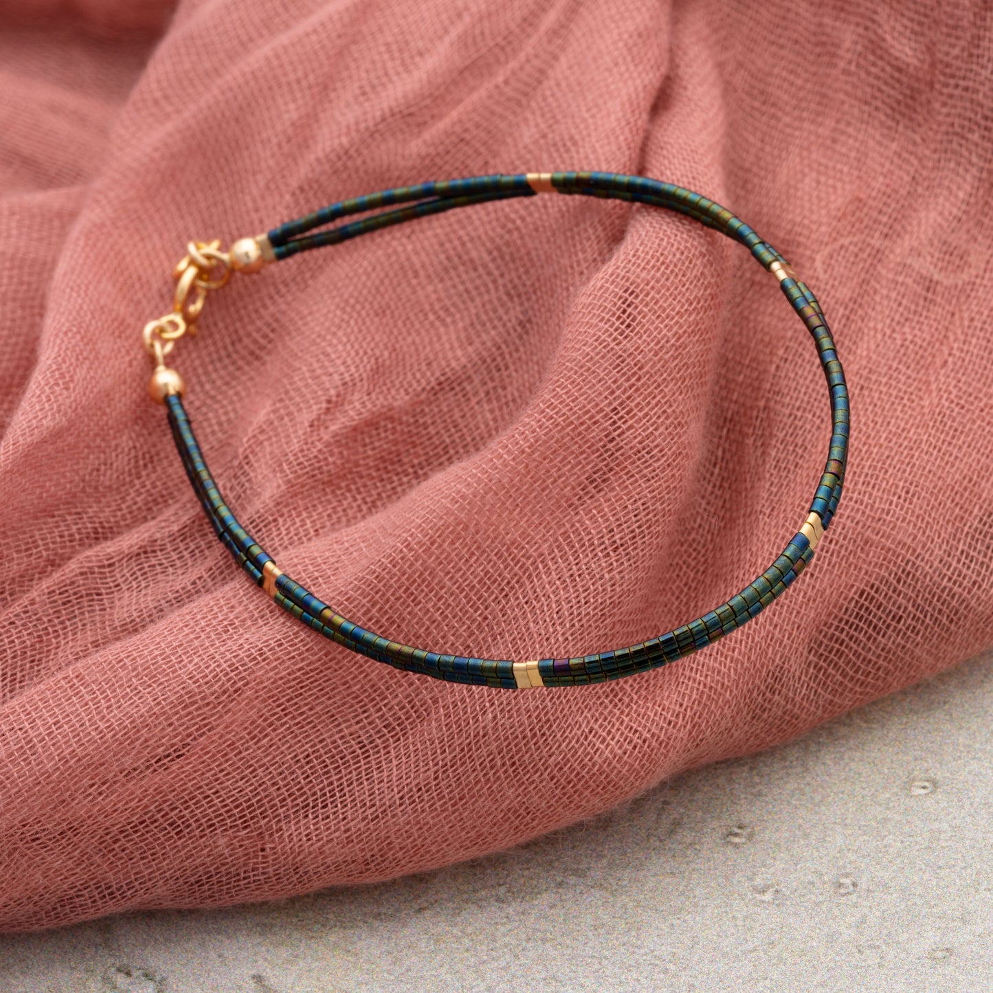 double strand bracelet with iridescent dark teal and green miyuki beads